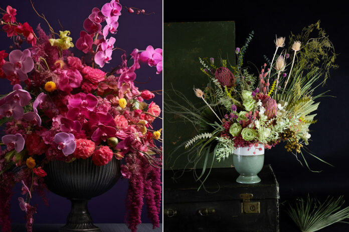 Maximalist crimson and burgundy floral centrepiece with fruit