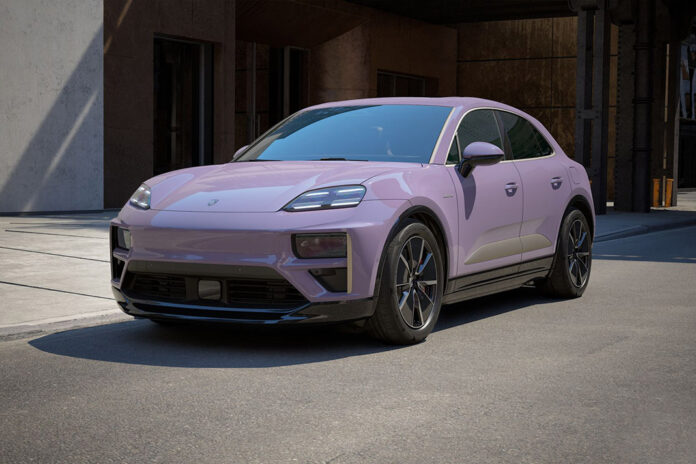 Ms. Al Awadhi driving Porsche Macan Turbo Electric in Bahrain