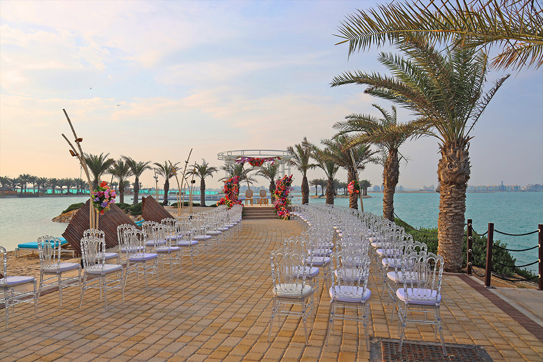 Private beachfront reception at sunset in Bahrain