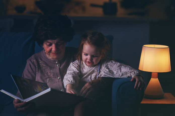 Child bonding with grandparent through storytelling